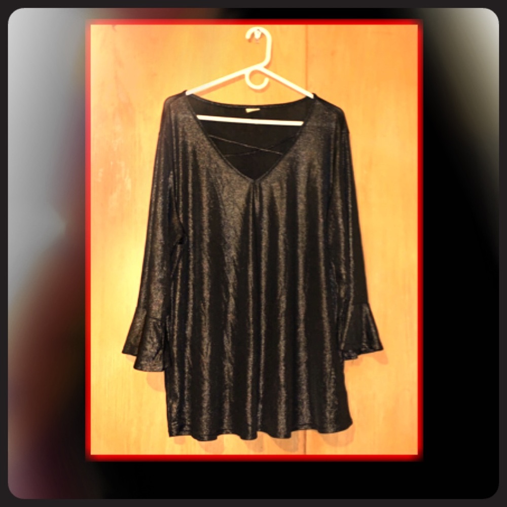 This a black and gold shimmer bell sleeve blouse